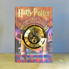 Load image into Gallery viewer, Harry Potter and the Scorcerer&#39;s Stone Skeleton Gears Book Clock - The Clock Library
