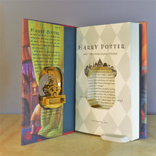 Load image into Gallery viewer, Harry Potter and the Scorcerer&#39;s Stone Skeleton Gears Book Clock - The Clock Library
